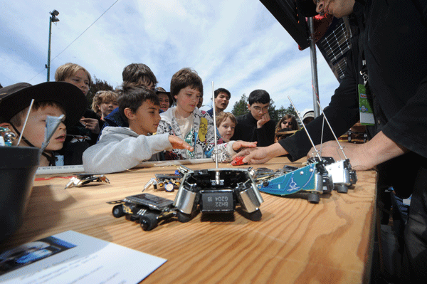 Kids with bots at Maker Faire Bay Area